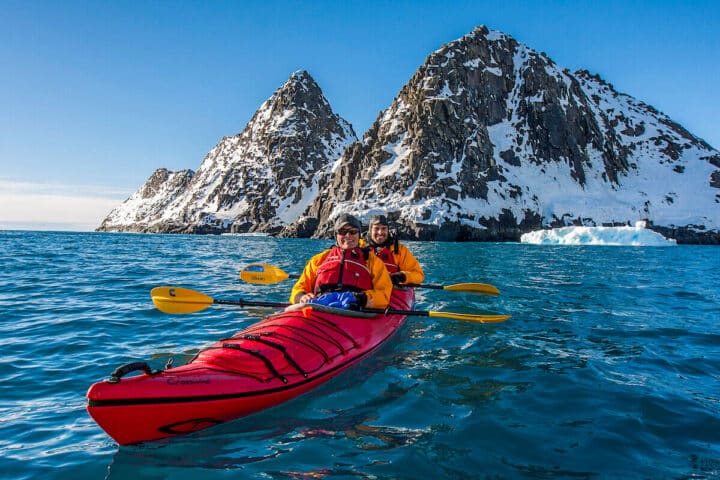 Kayakers in Antartica.