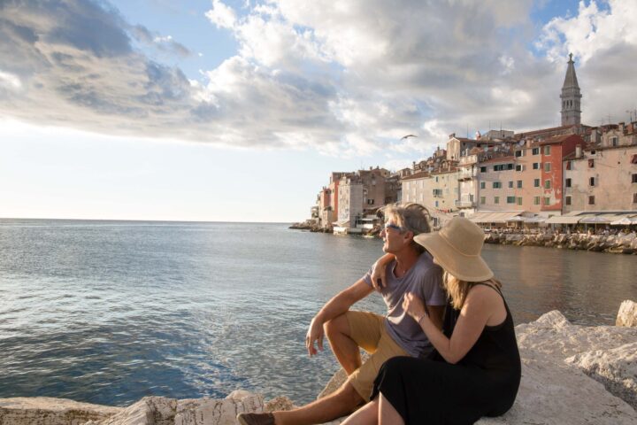 A couple enjoying an ocean in Croatia.