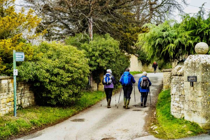 Three hikers in Broadway Village.