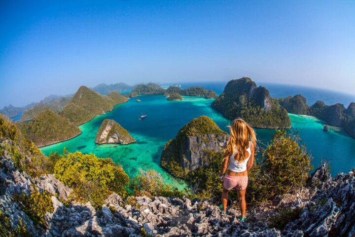 A tourist on a peak in Indonesia.