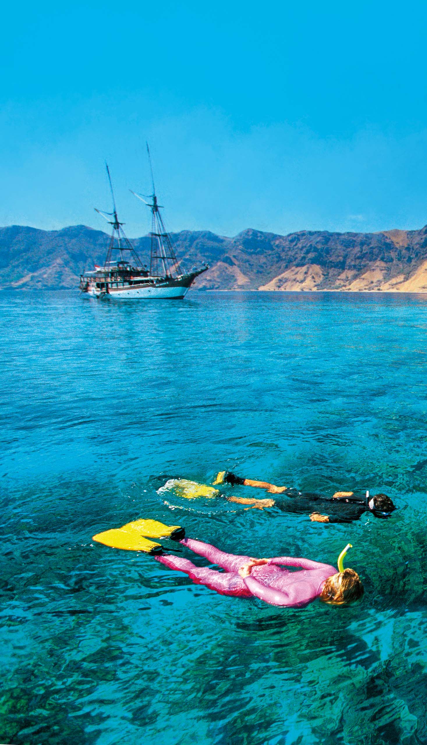 A couple snorkeling in Indonesia.