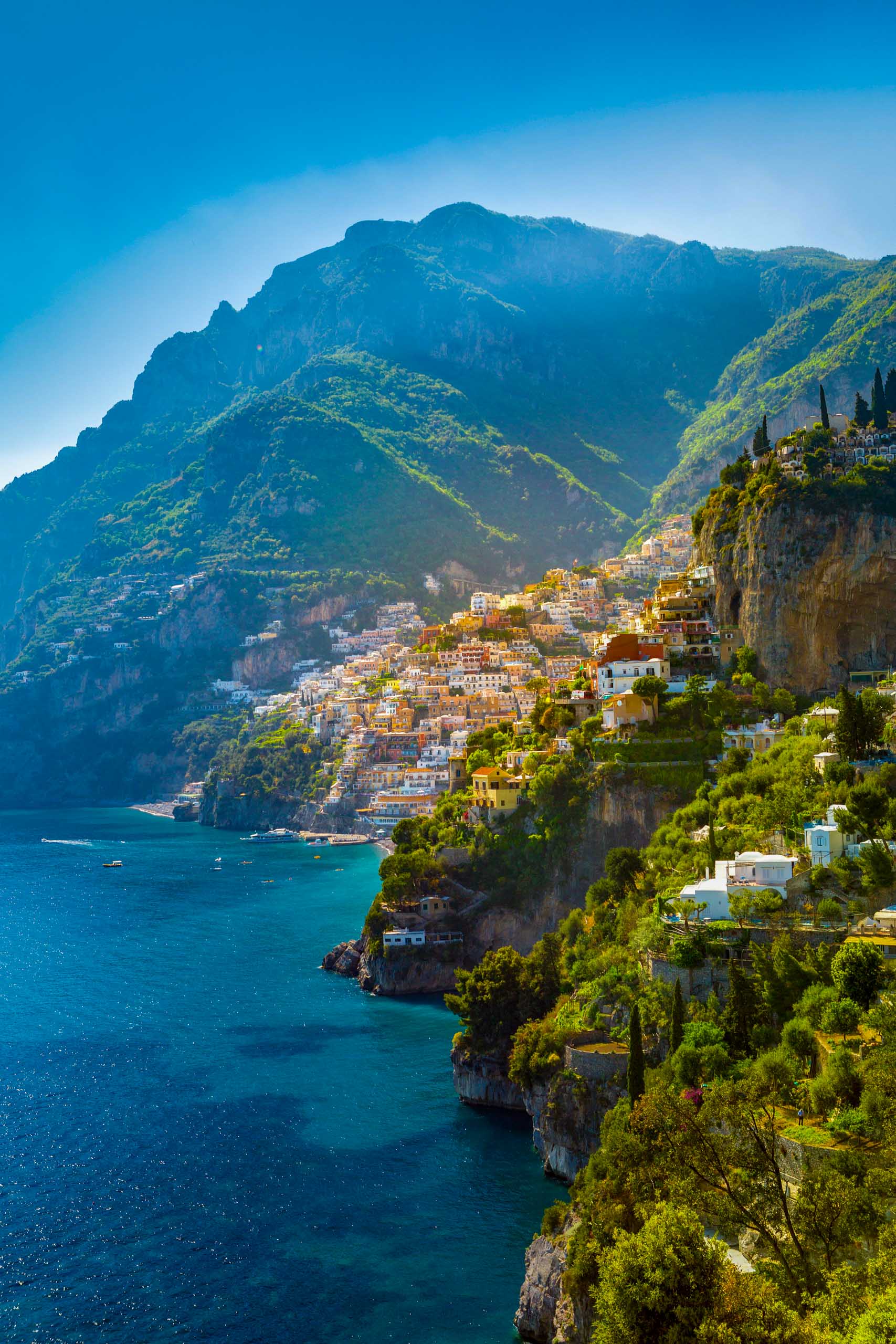 Morning view of Positano cityscape on coast line of mediterranean sea, Italy.