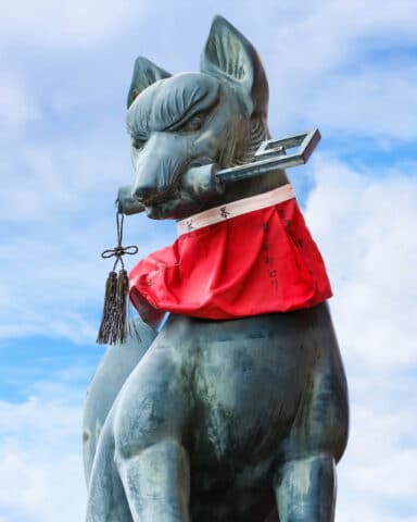 Kitsune sculpture at Fushimi Inari-taisha shrine in Kyoto.