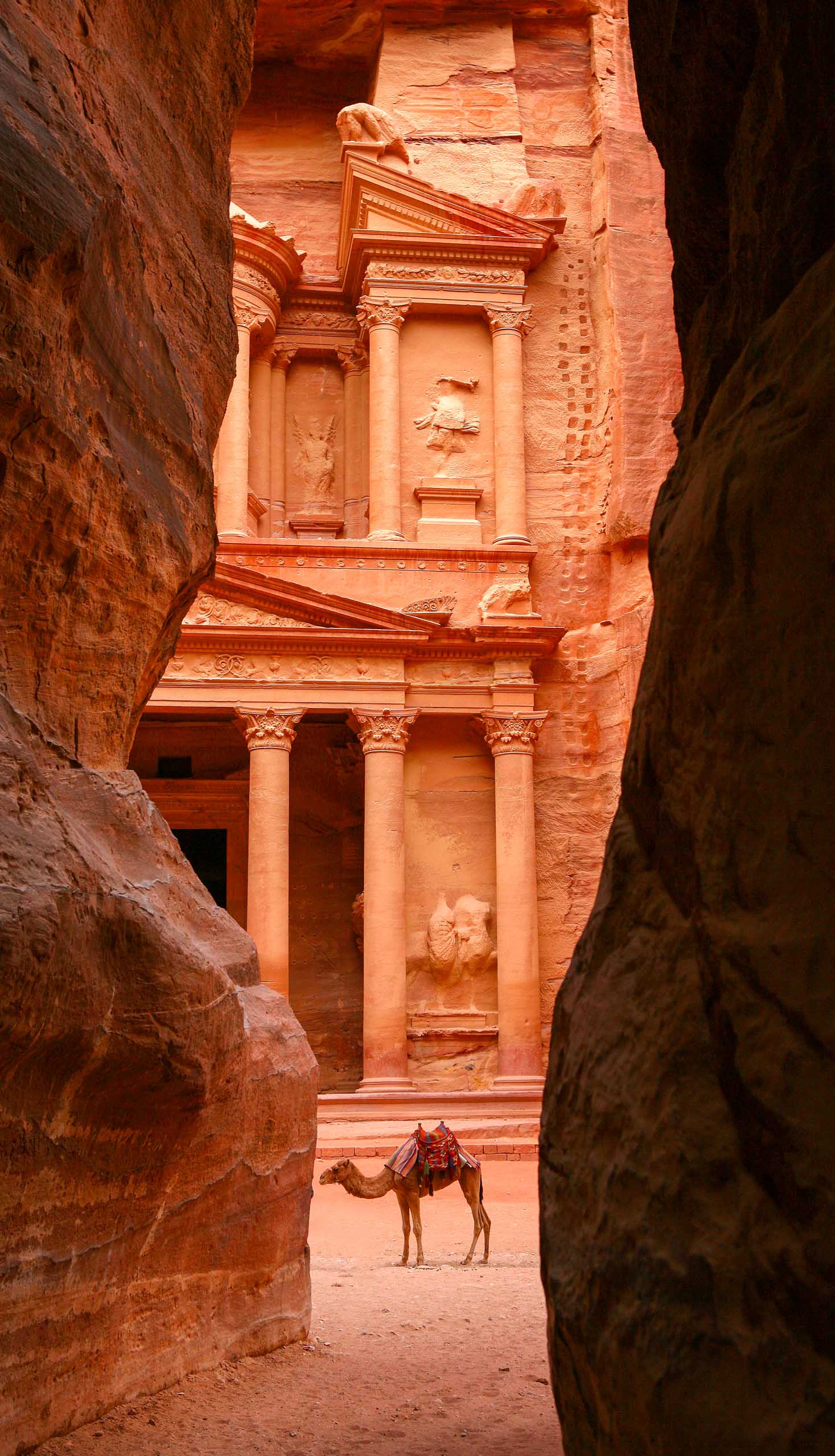 A glimpse of Al Khazneh, the Treasury, from the Siq, Petra, Jordan.