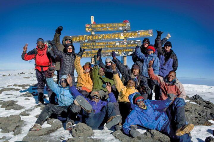 A group of hikers at the top of Uruhu peak.