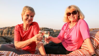 Two women enjoying a glass of wine in Madagascar.