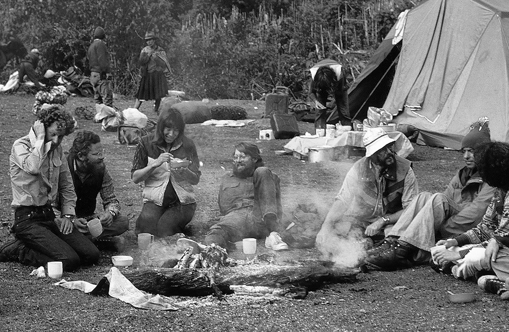 A group of people around a campfire.