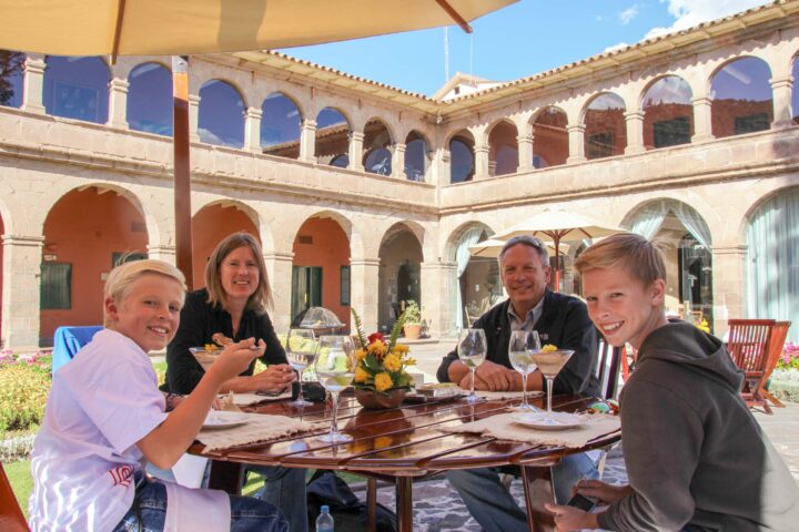 A group of people enjoying a meal together.