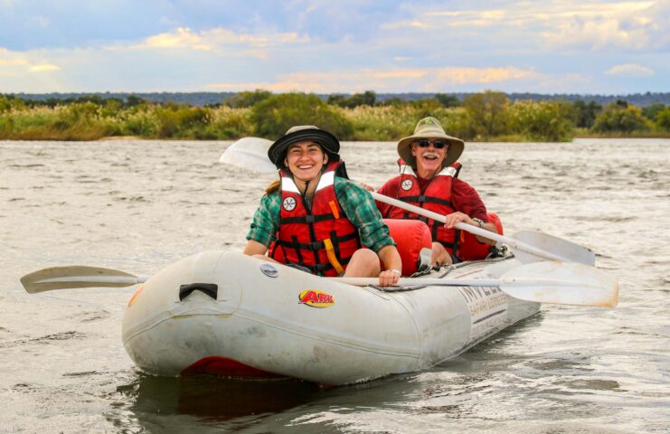 Two tourists canoeing in Zimbabwe.